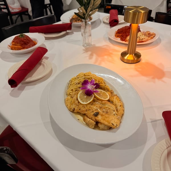 Chicken Francese served tableside in the dining room